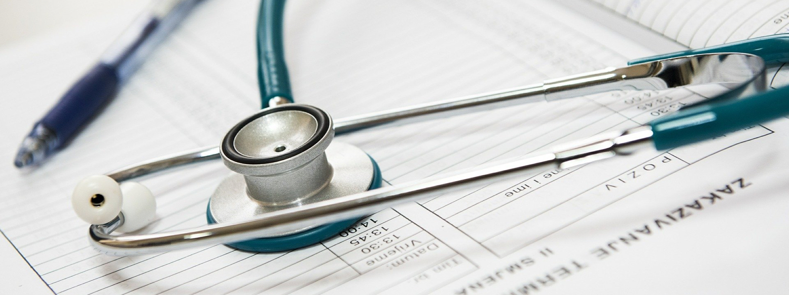 stethoscope on piece of paper new grad nursing credentials