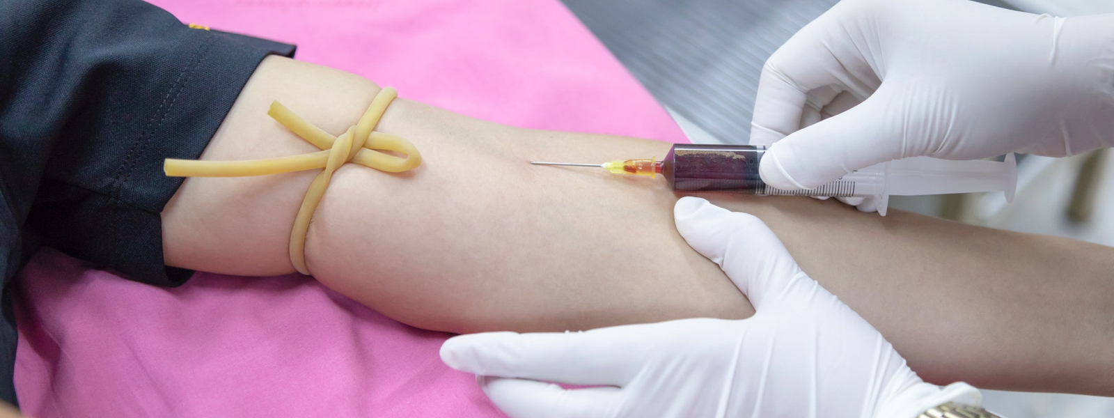 sticking needle into arm new grad nursing skills