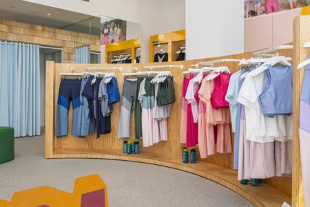 outdoor voices athletic gear on clothing racks in store