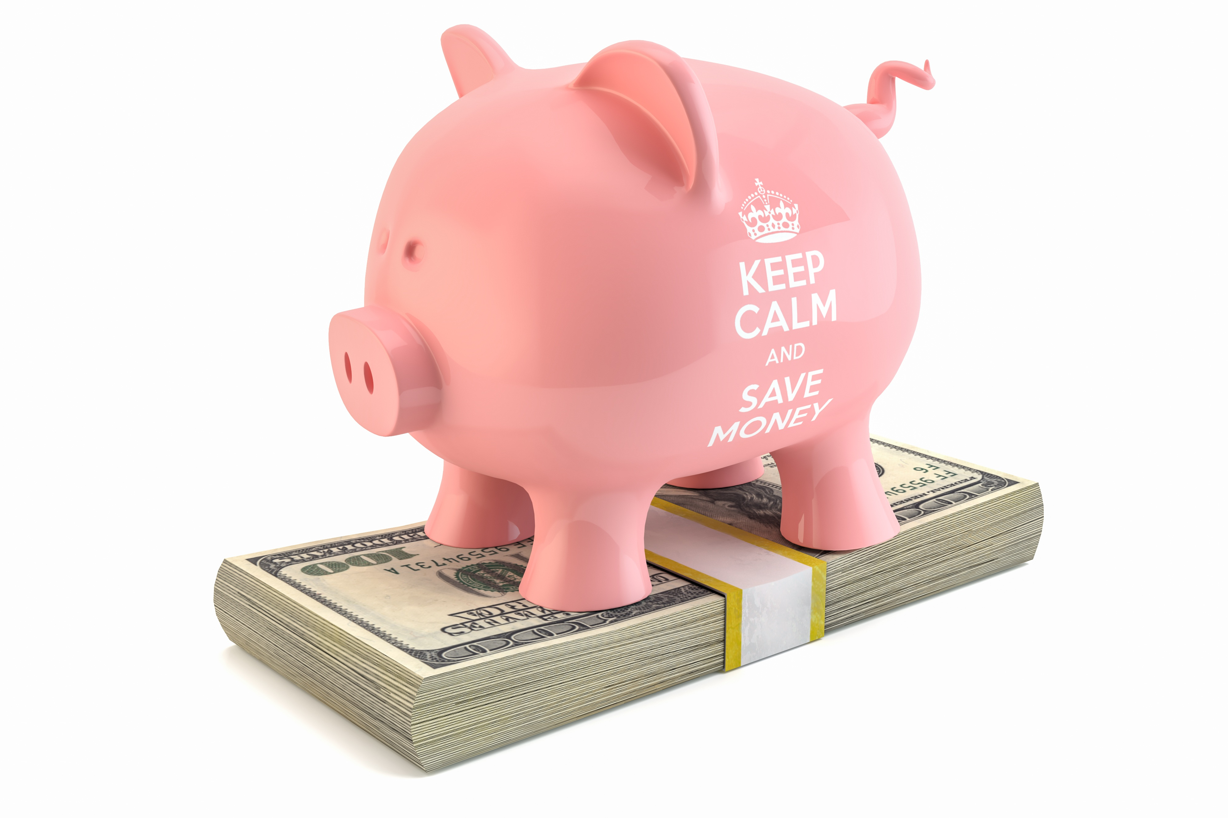 piggy bank sitting on stack of hundred-dollar bills