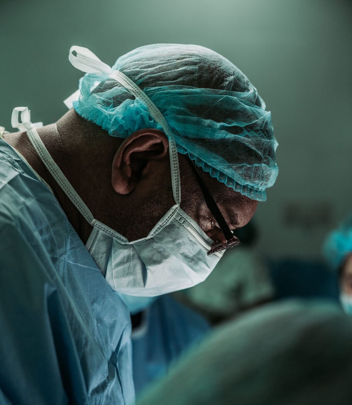 nurse scrubs man wearing scrubs in surgery surgical mask