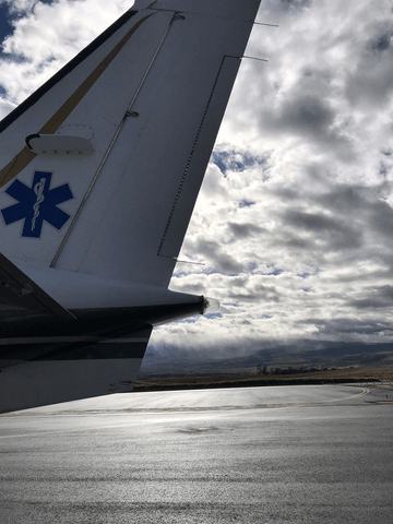 tail of plane on runway flight nursing
