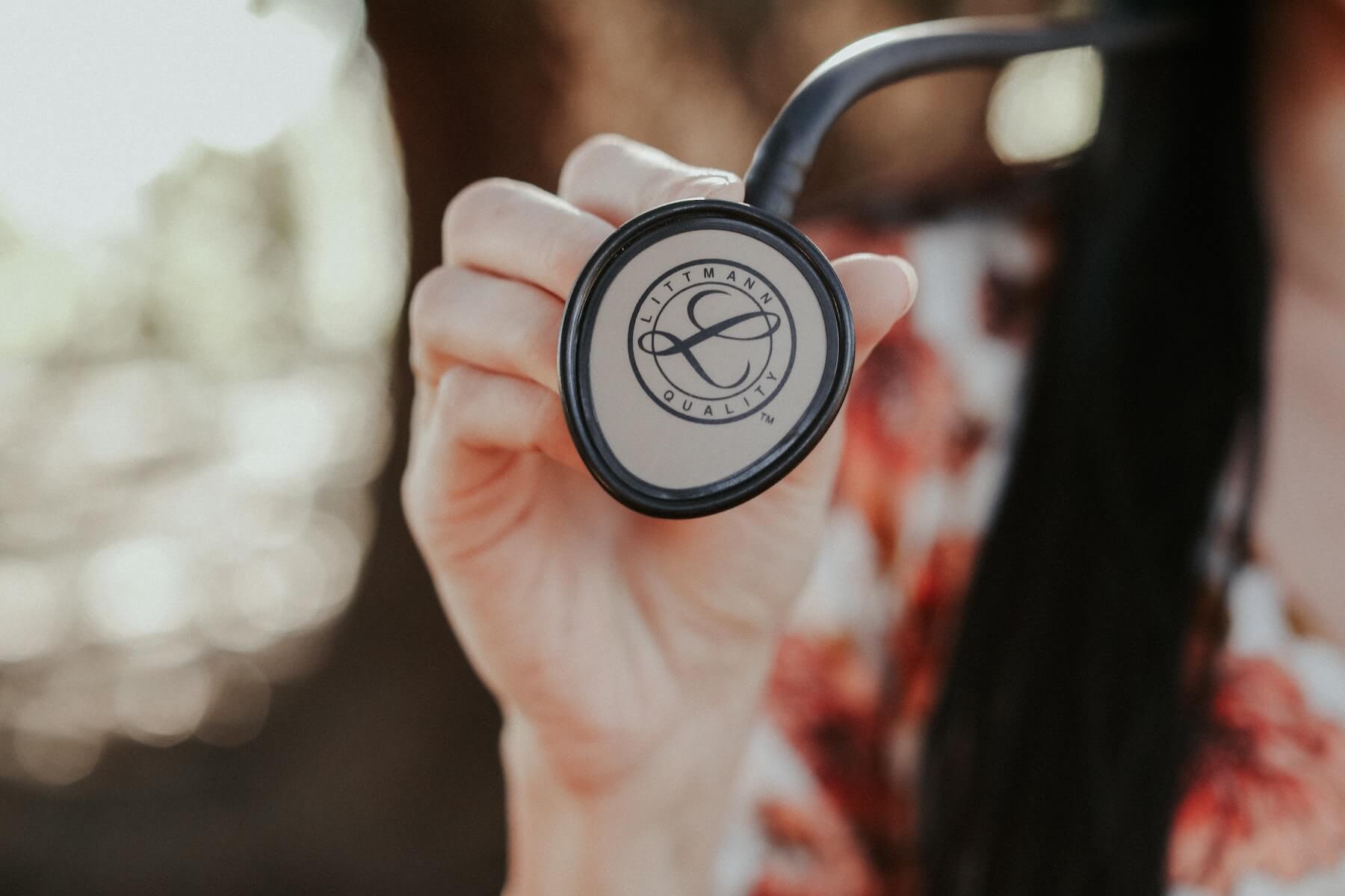 woman holding stethoscope littmann future of nursing education