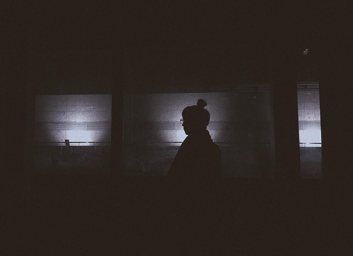 woman in dark hallway scary nursing stories night shift
