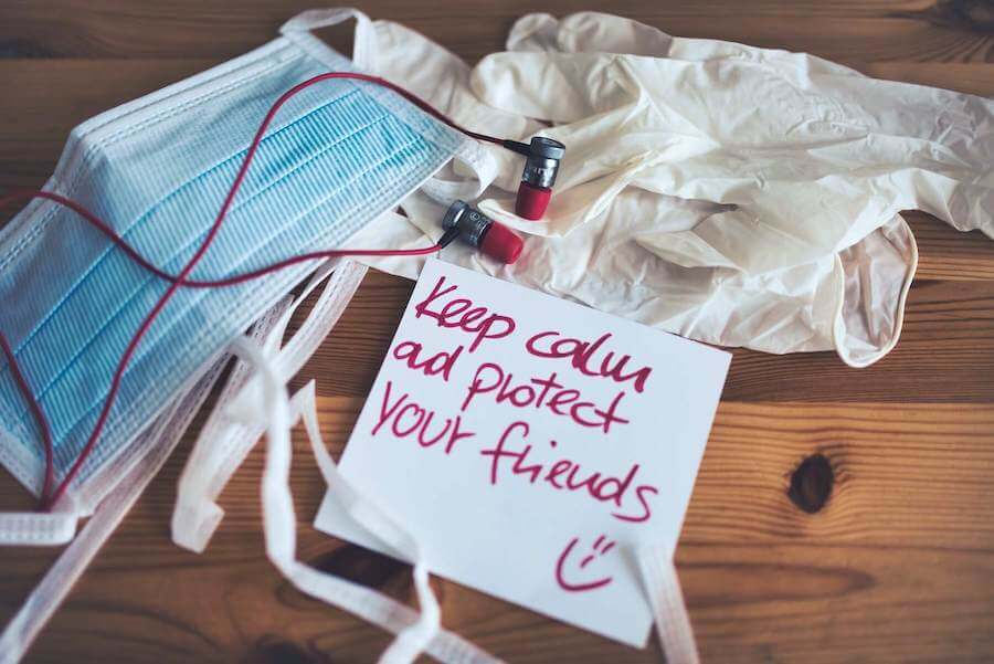 surgical masks and gloves on table with headphone and note keep calm and protect your friends being a nurse in 2020 proud to be a nurse
