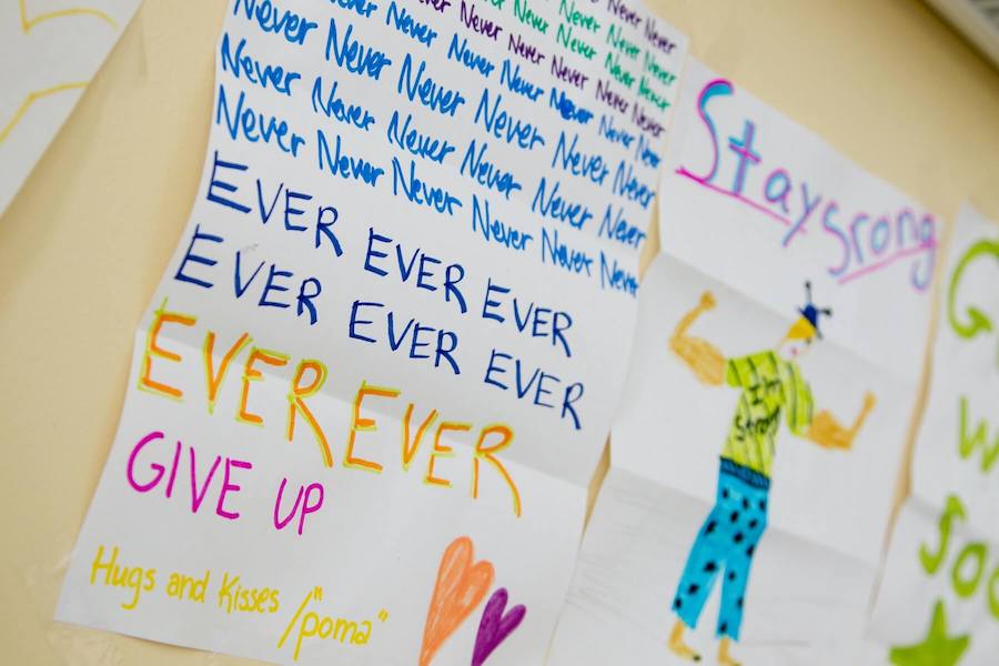 handwritten card saying to never give up and stay strong pediatric nurse