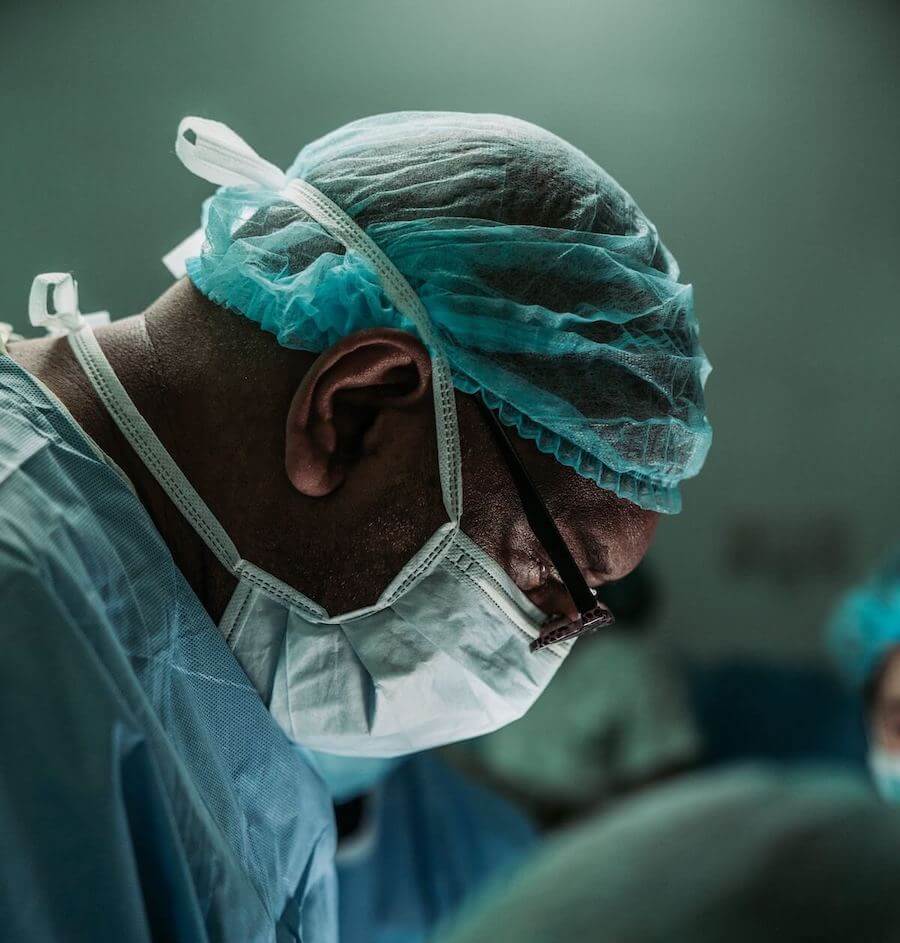 nurse scrubs man wearing scrubs in surgery surgical mask