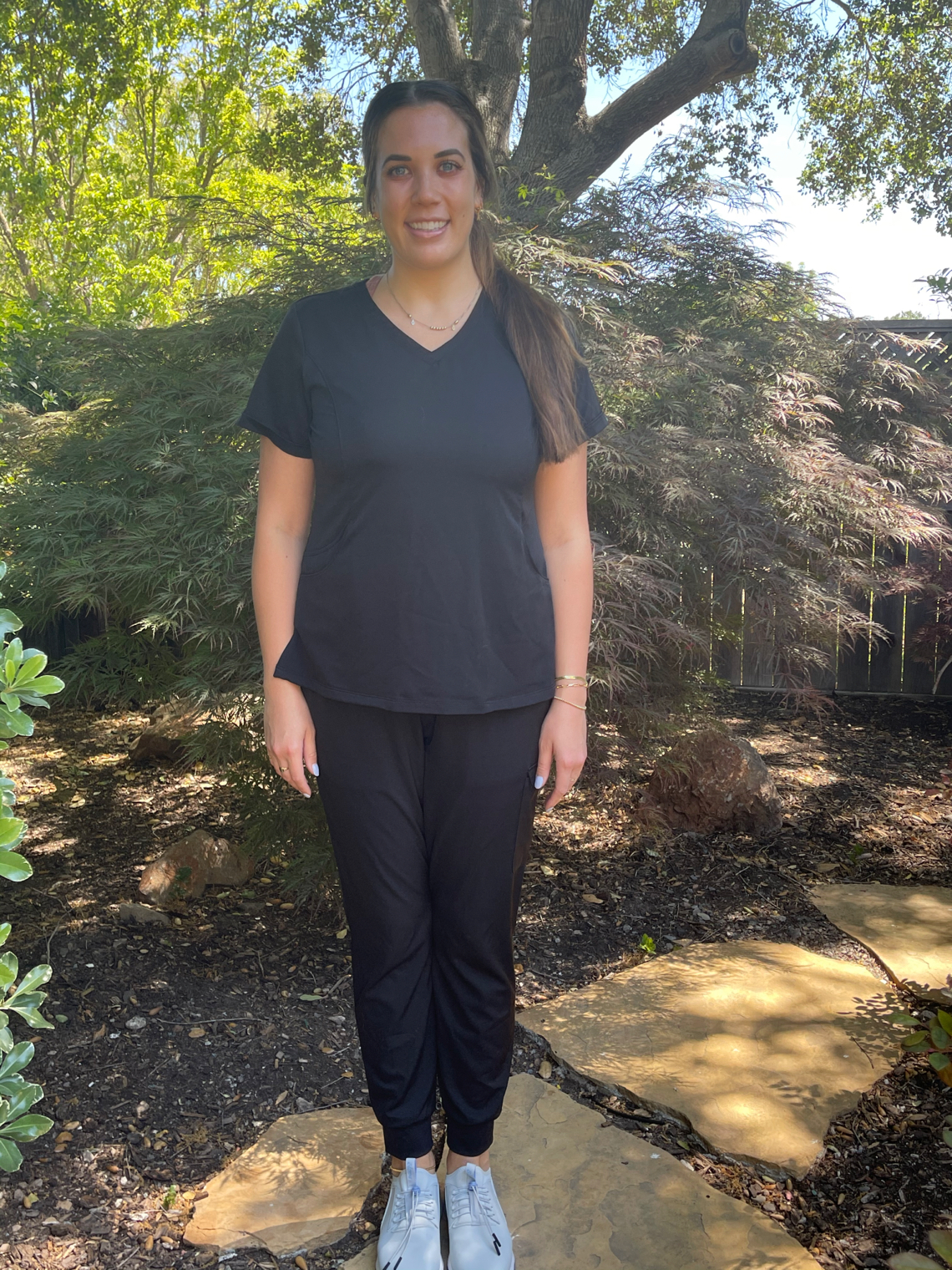 Nurse in scrubs outside
