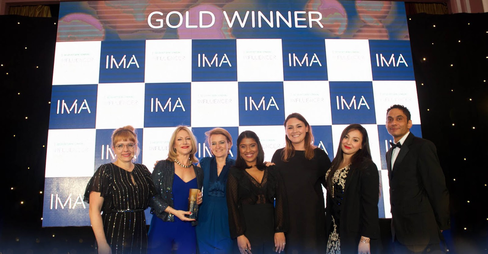 Traackr Team receiving Best Influencer Discovery & Best Campaign Planning & Management Awards at IMA19