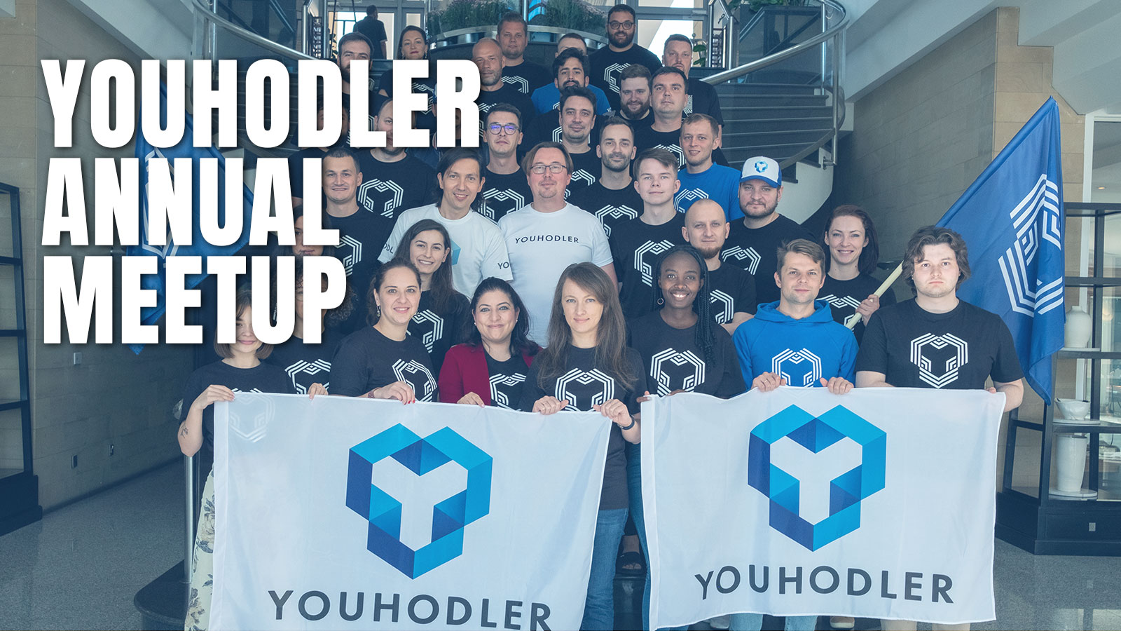 The youhodler team poses for a group photo at the 2021 YouHodler team building conference.