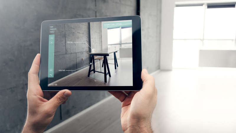 Man using augmented reality via mobile app