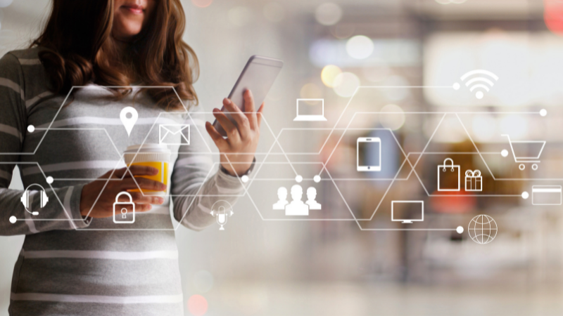 Woman on mobile phone and representing an omnichannel strategy