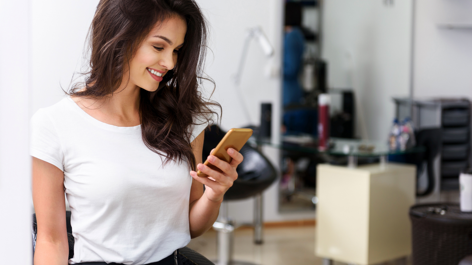 A customer looking at her smartphone