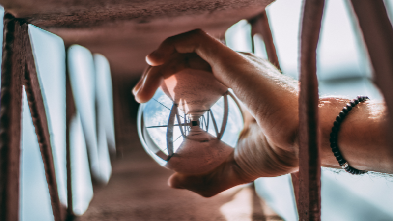 Transparent ball being held in someone's hands