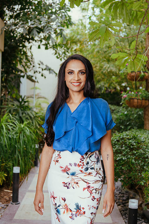 Natasha Rockstrom picture in flower skirt - Divine Business Coaching prorgram