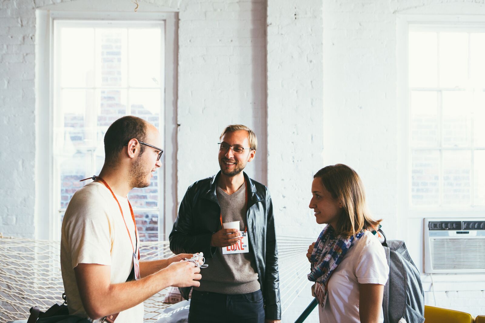 three people talking