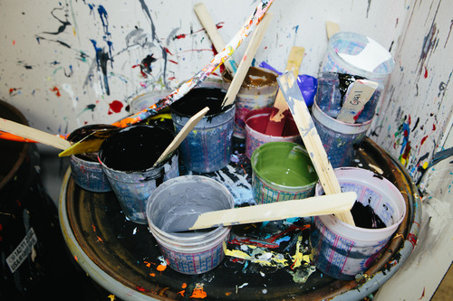 ink mixing containers on stool