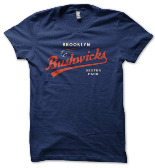 navy shirt with red type and baseball