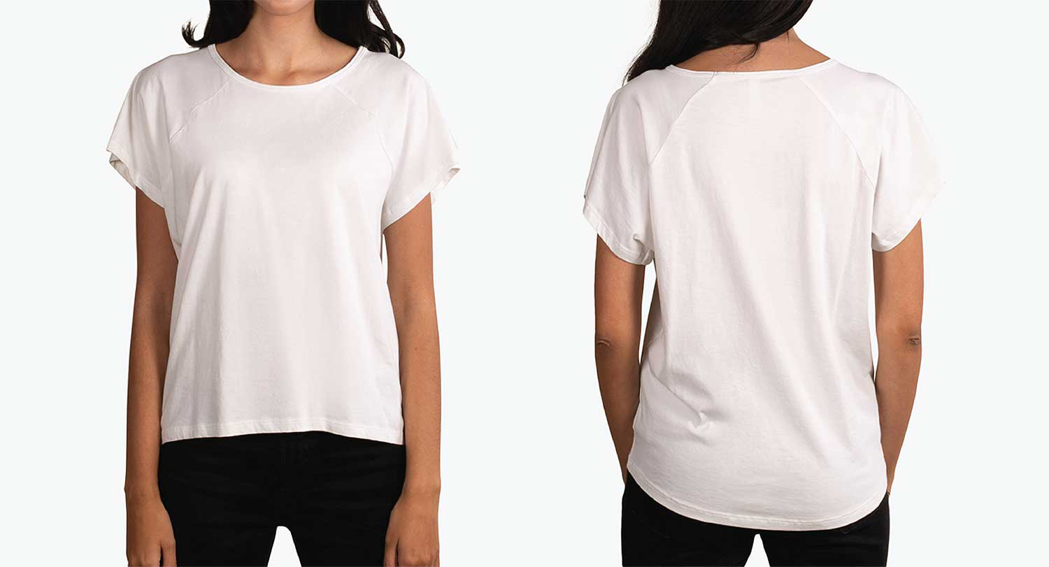 woman wearing scoop neck front and back white shirt