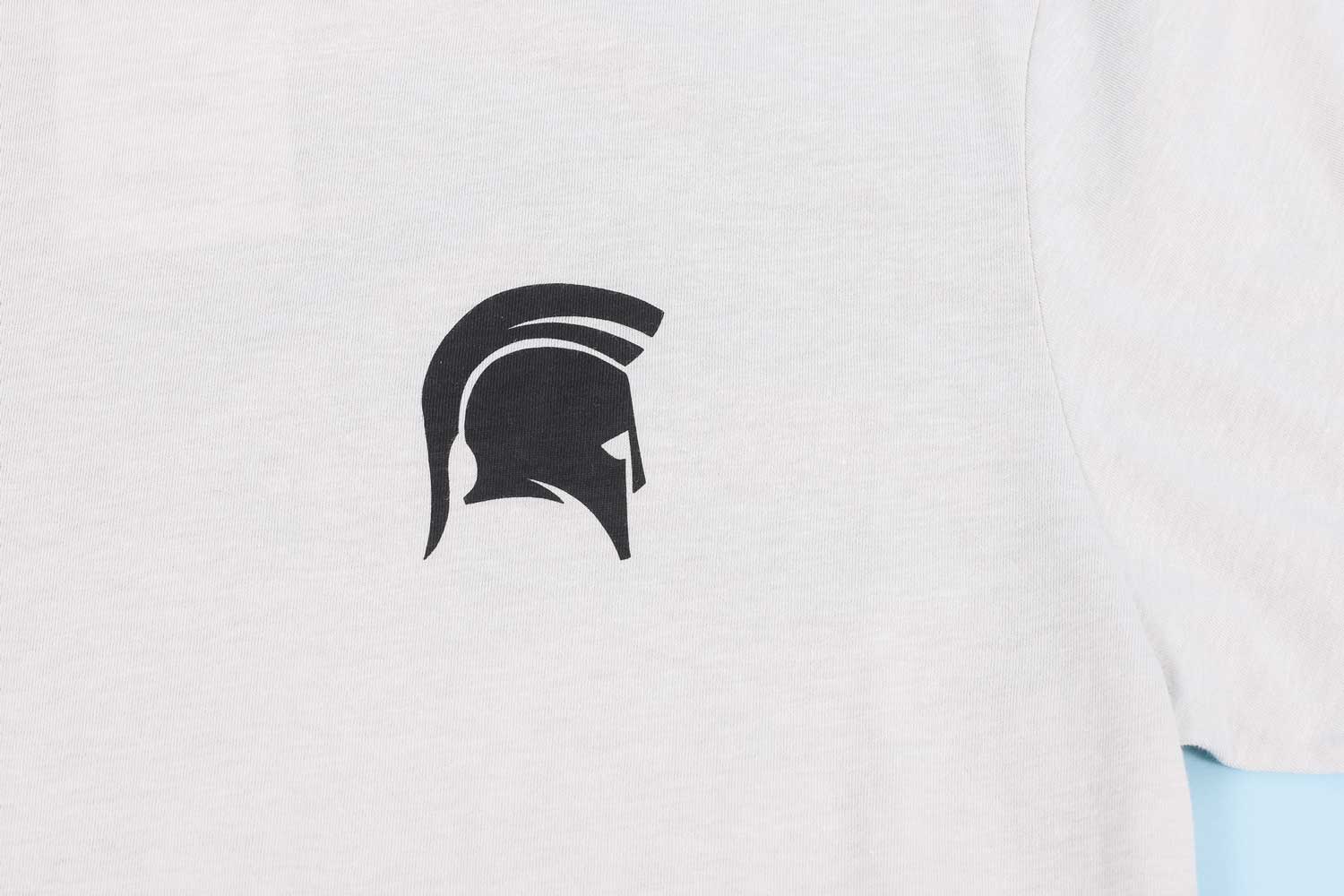 White shirt with black spartan helmet logo