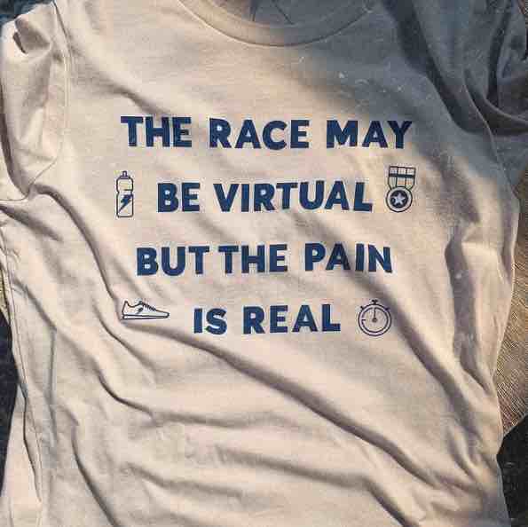 A shirt that says "the race may be virtual but the pain is real"