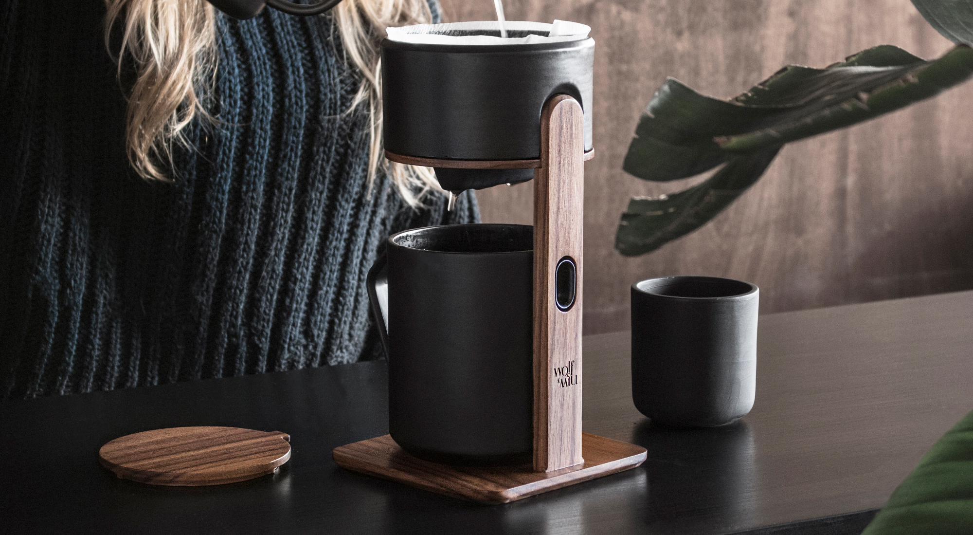 A pour over coffee maker with design in 