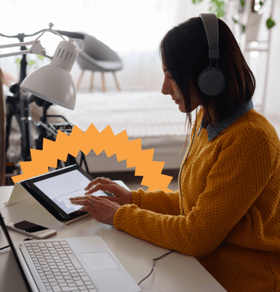 women working remotely on laptop