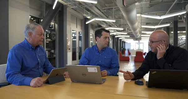 Asset Vue founders with client