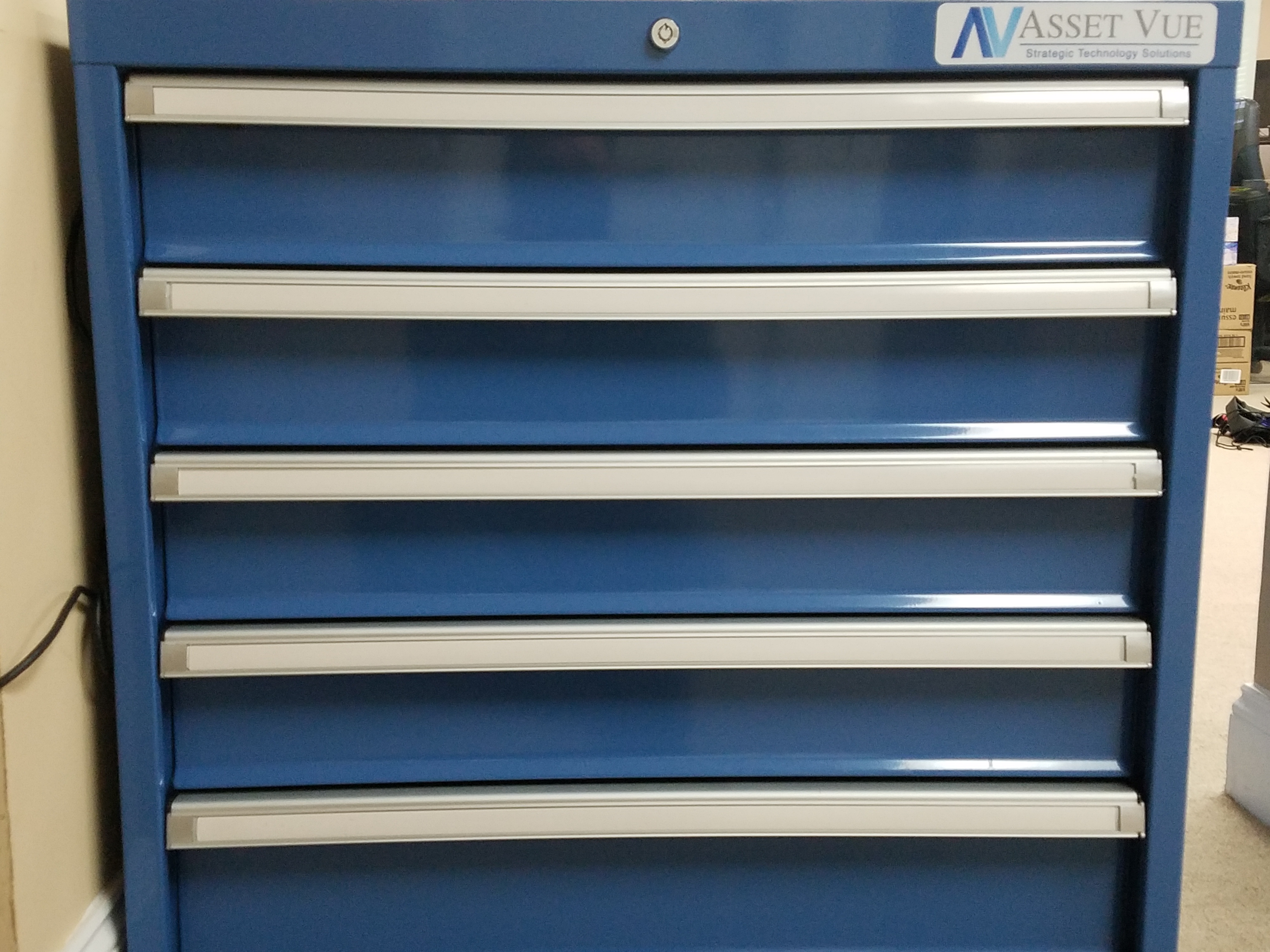 Image of man at a server rack