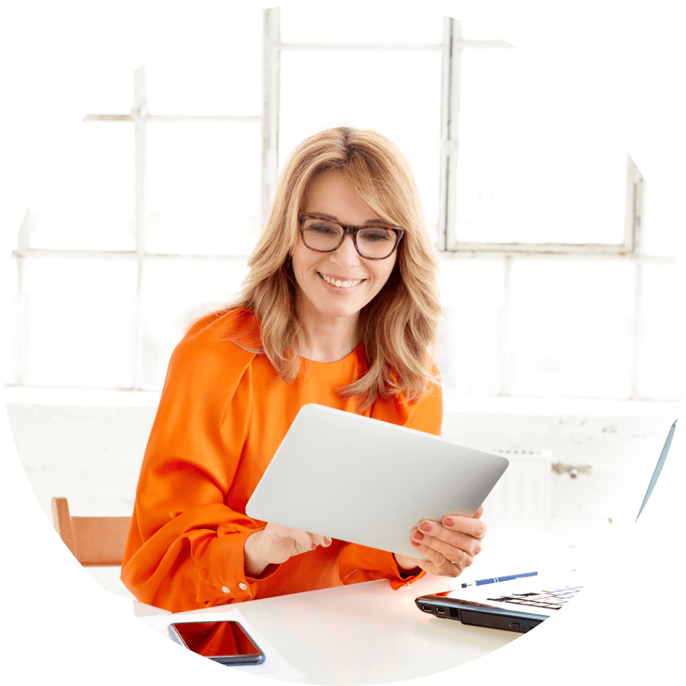 Lady in orange shirt with iPad