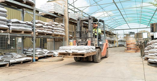 Bagged garden supplies on pallets