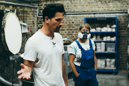 Lewis in the studio, with Natalie on kiln loading duty. Photo: Paul Fuller