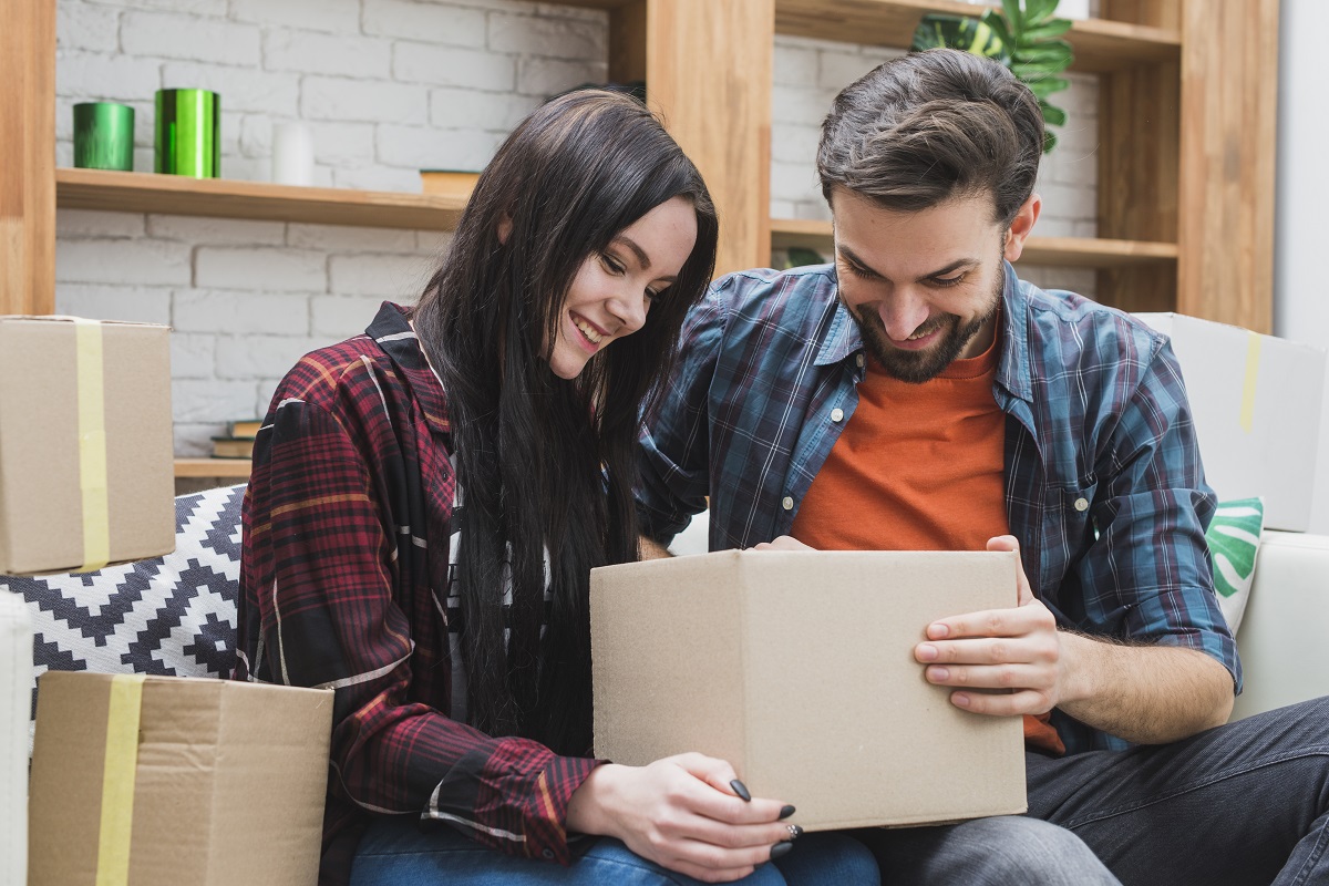 couple looking at a box