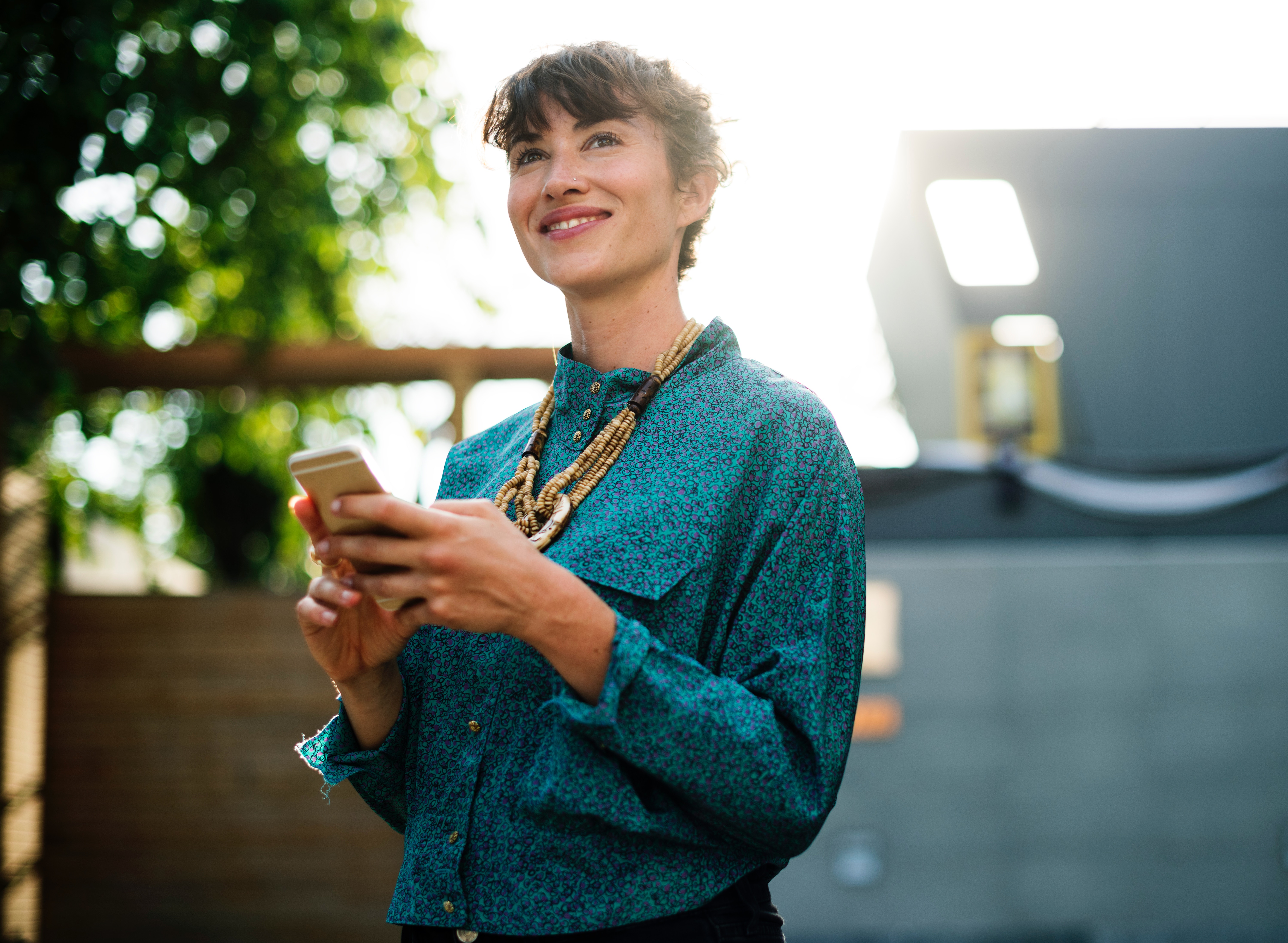 smiling woman on a phone