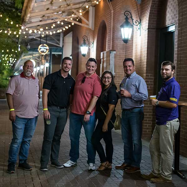 Group of Himmel employees outside of Fulton Alley in New Orleans