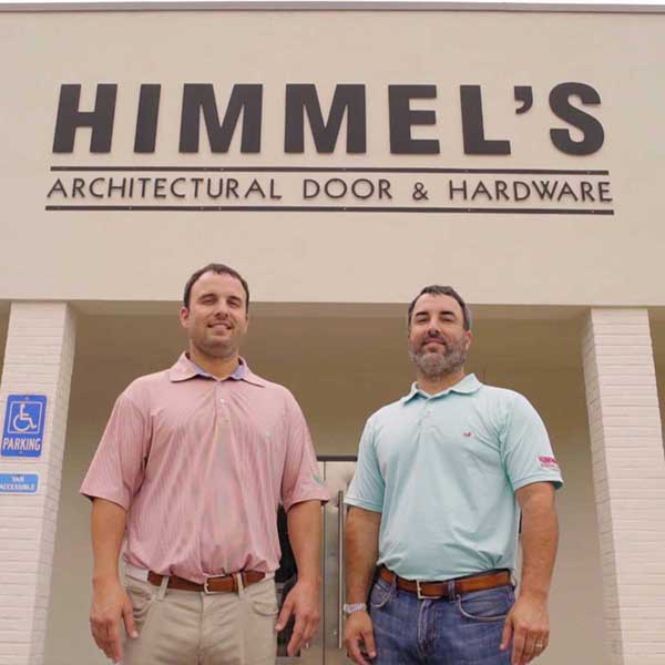 Jay and Chad Himmel in front of the Prairieville Himmel building