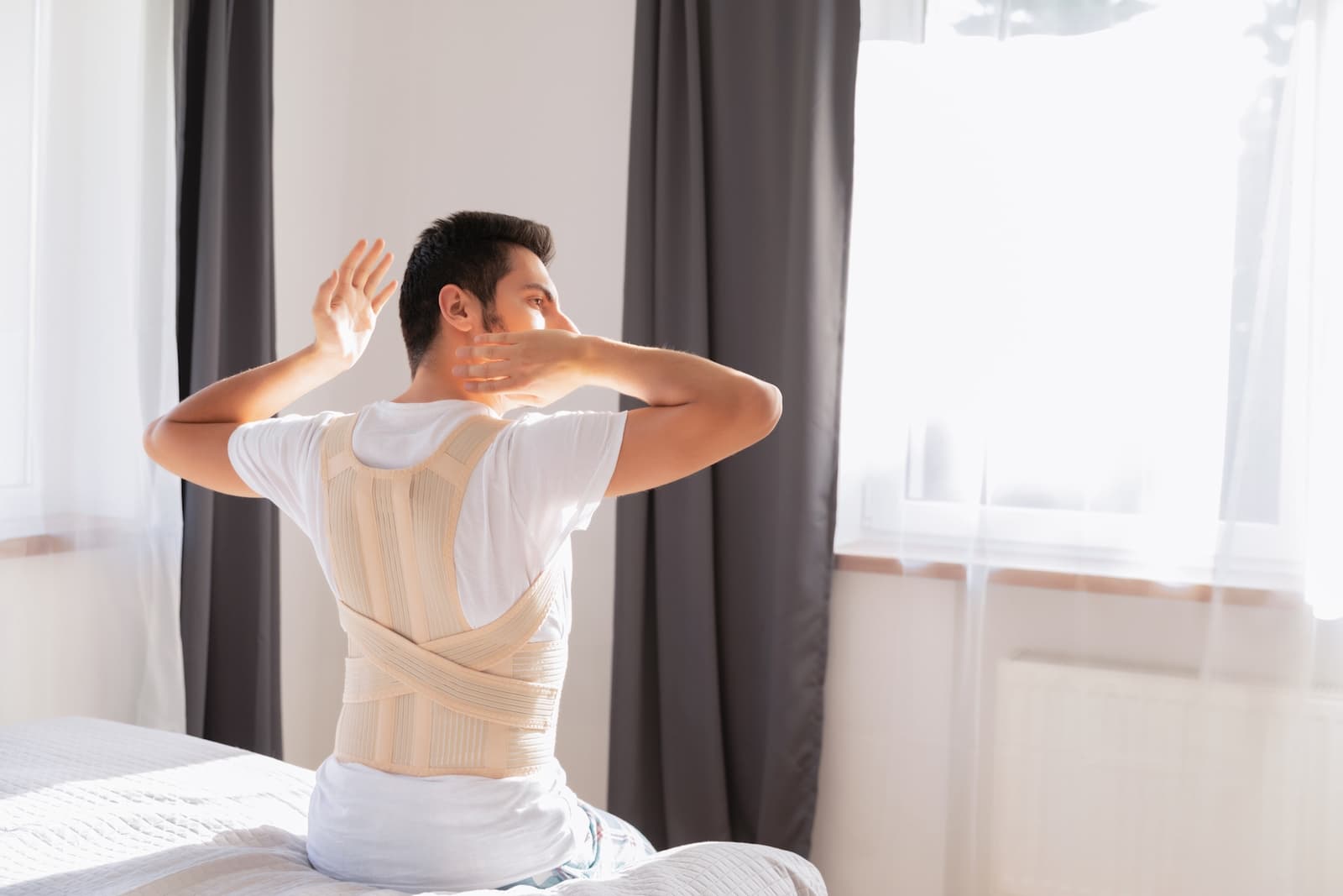 Tight Back Muscles? 5 Causes and What to Do About Them | Dorsal
