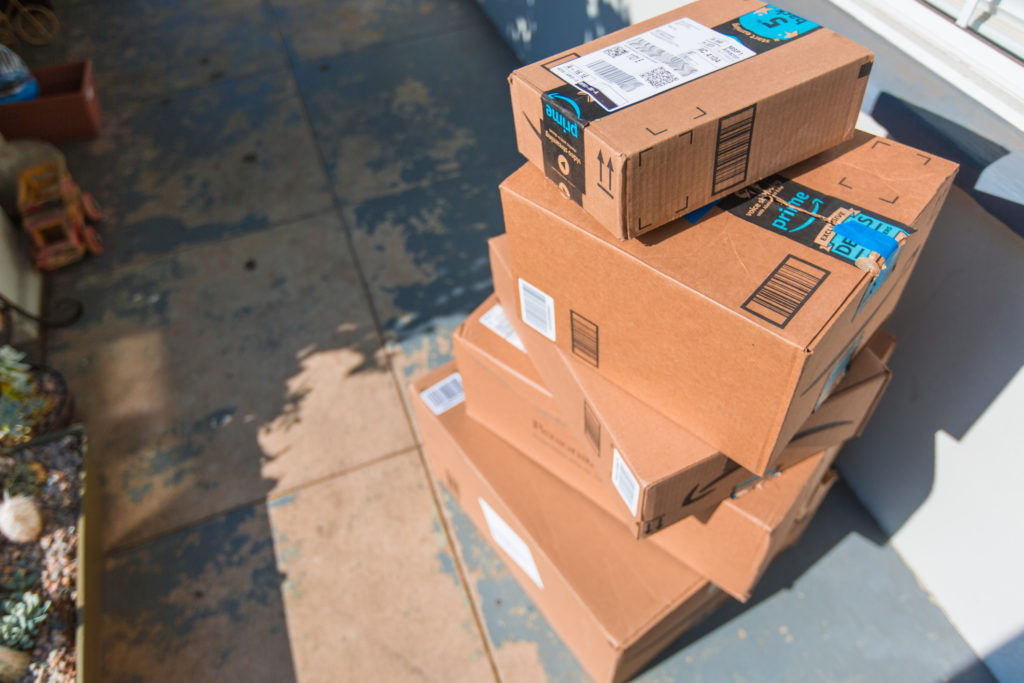 Pile of delivered packages left outside.