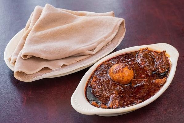<strong>Doro Wot : </strong>Chicken stew with garlic onion and herbal butter served with boiled egg.