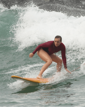 Megan surfing on their day off.