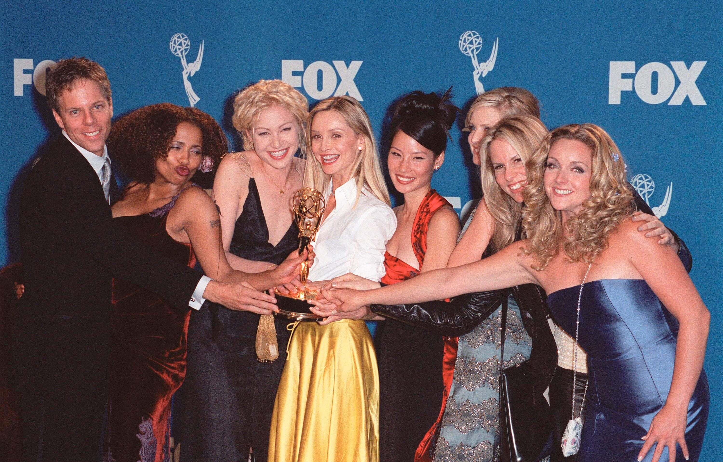 The Ally McBeal cast, including Calista Flockhart and Lucy Liu, at the 51st Annual Emmy Awards in Los Angeles where the show won the Best Comedy Series Award. Photo by Paul Smith / Featureflash.