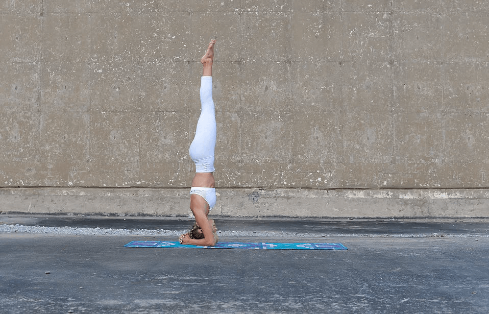 Straighten your legs and you're officially doing a headstand!