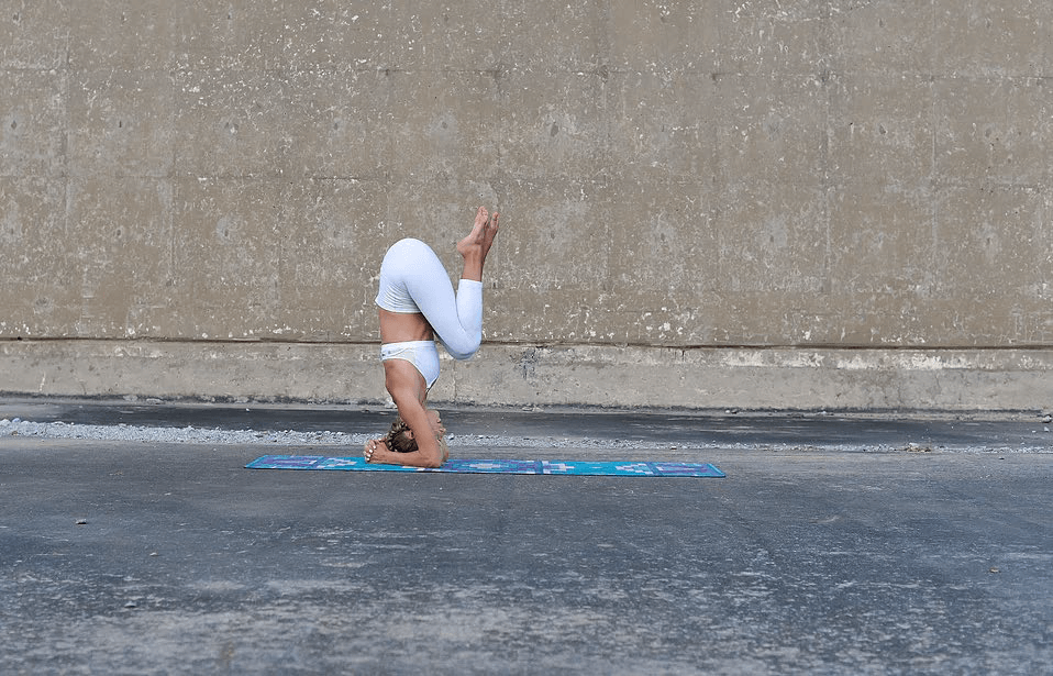 Next, bring both knees in for a full tuck.