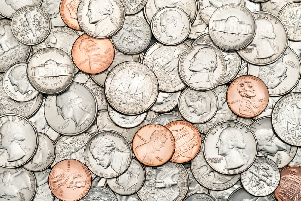 A zoomed in shot of various American coins.
