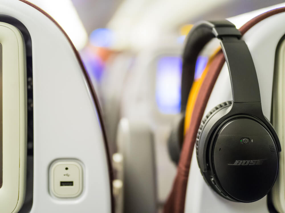 Noise cancelling headphones on a plane.