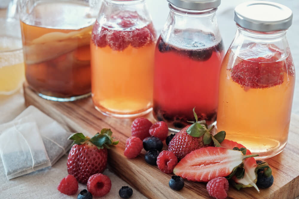 Jars of Kombucha with added fruit.