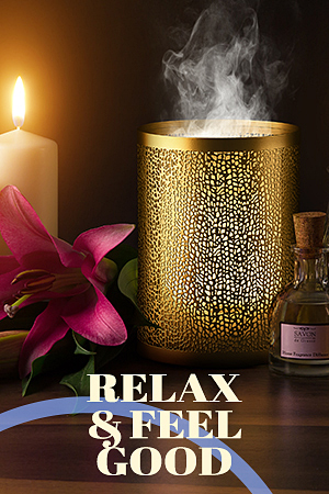 A gold diffuser with the words "Relax and Feel Good."