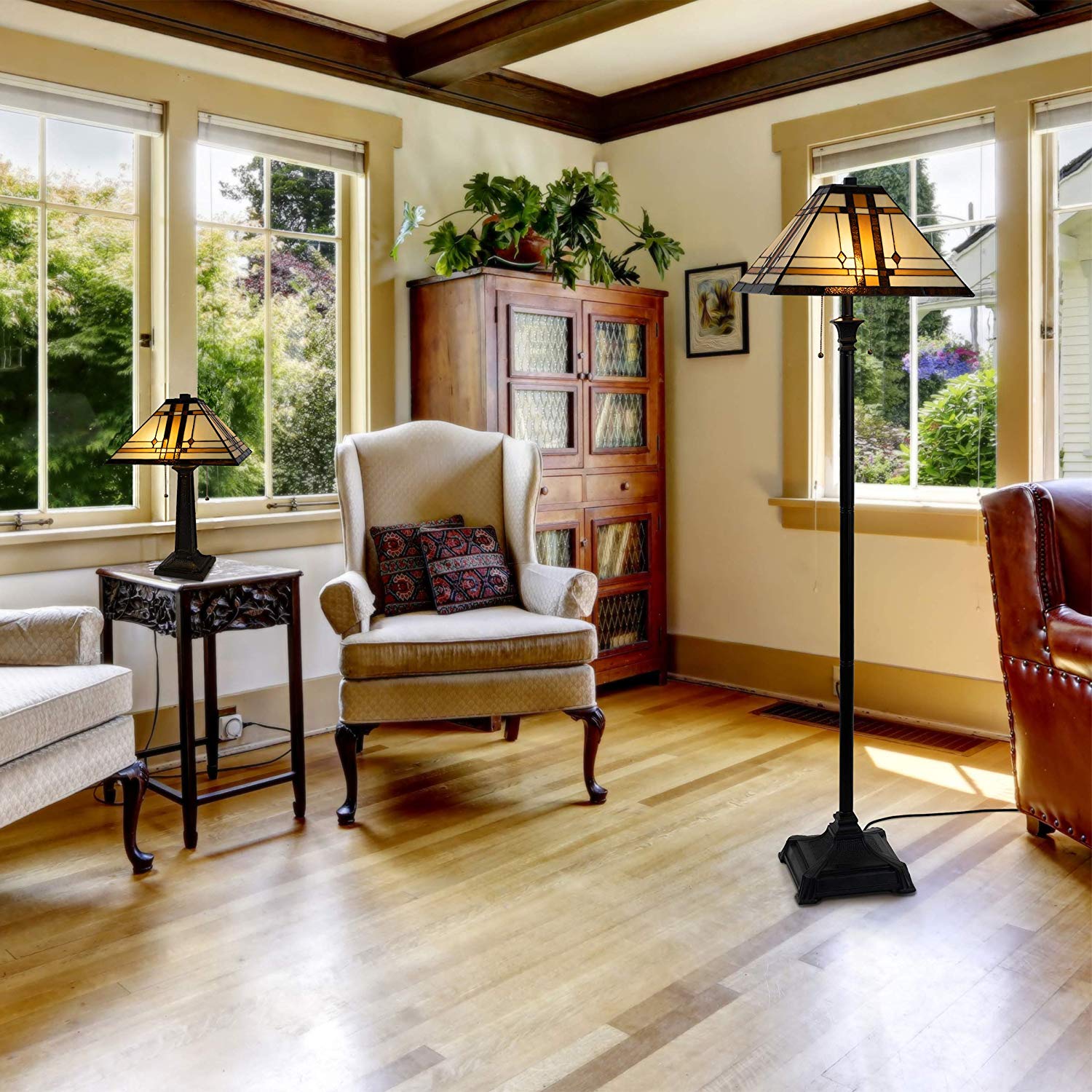 A living room with a tall floor lamp.