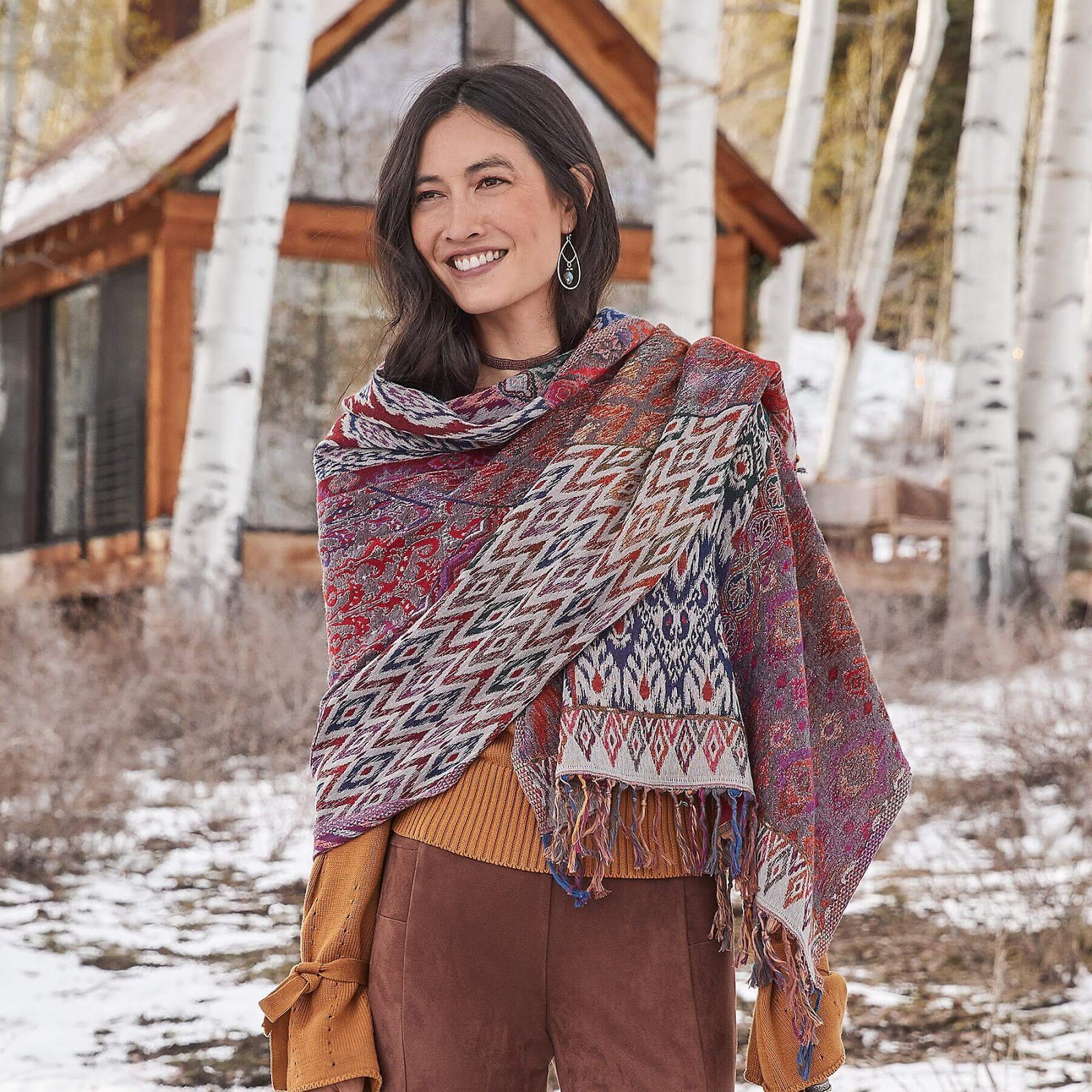 A woman outside in the snow with a Giulietta Scarf.