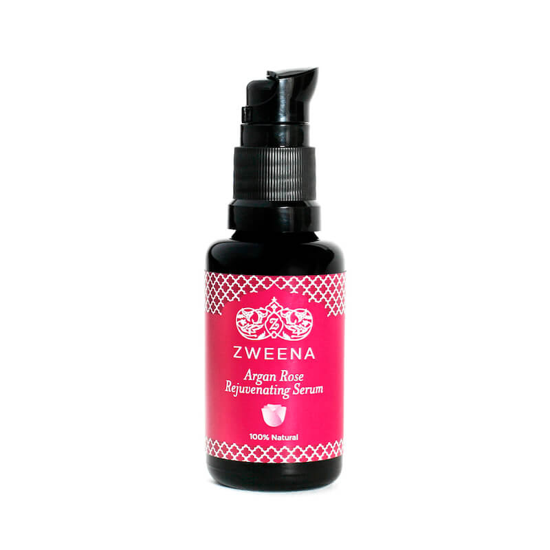 A bottle of Zweena Argan Rose Rejuvenating Serum.